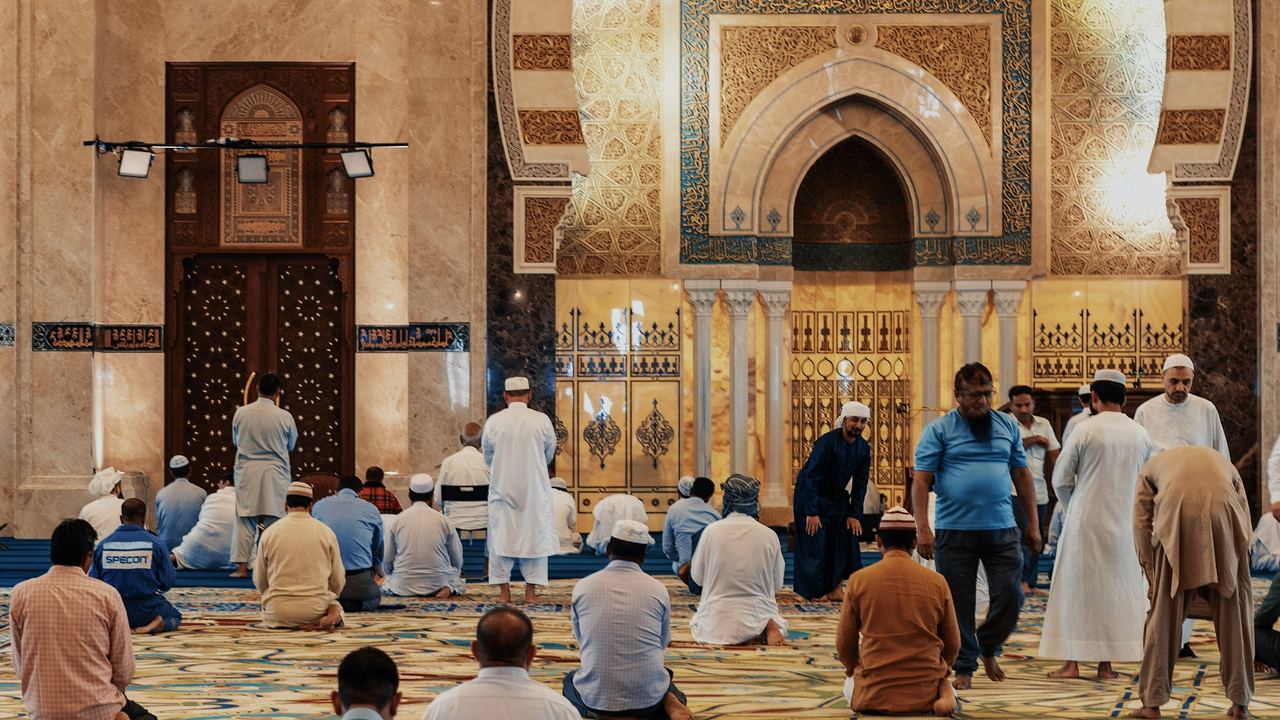 Muslims praying together in congregation at a mosque