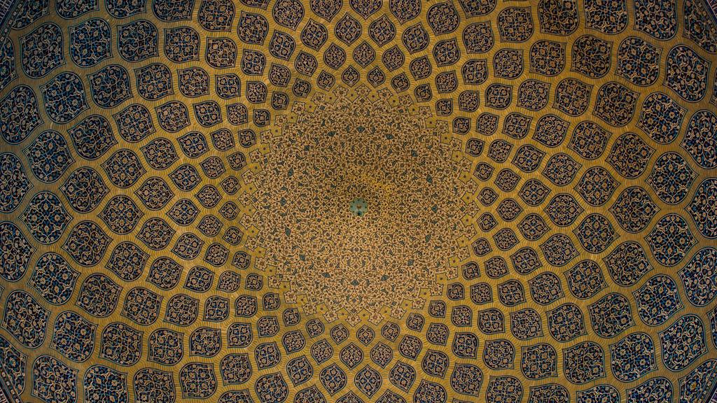 The intricate tiled dome of a mosque