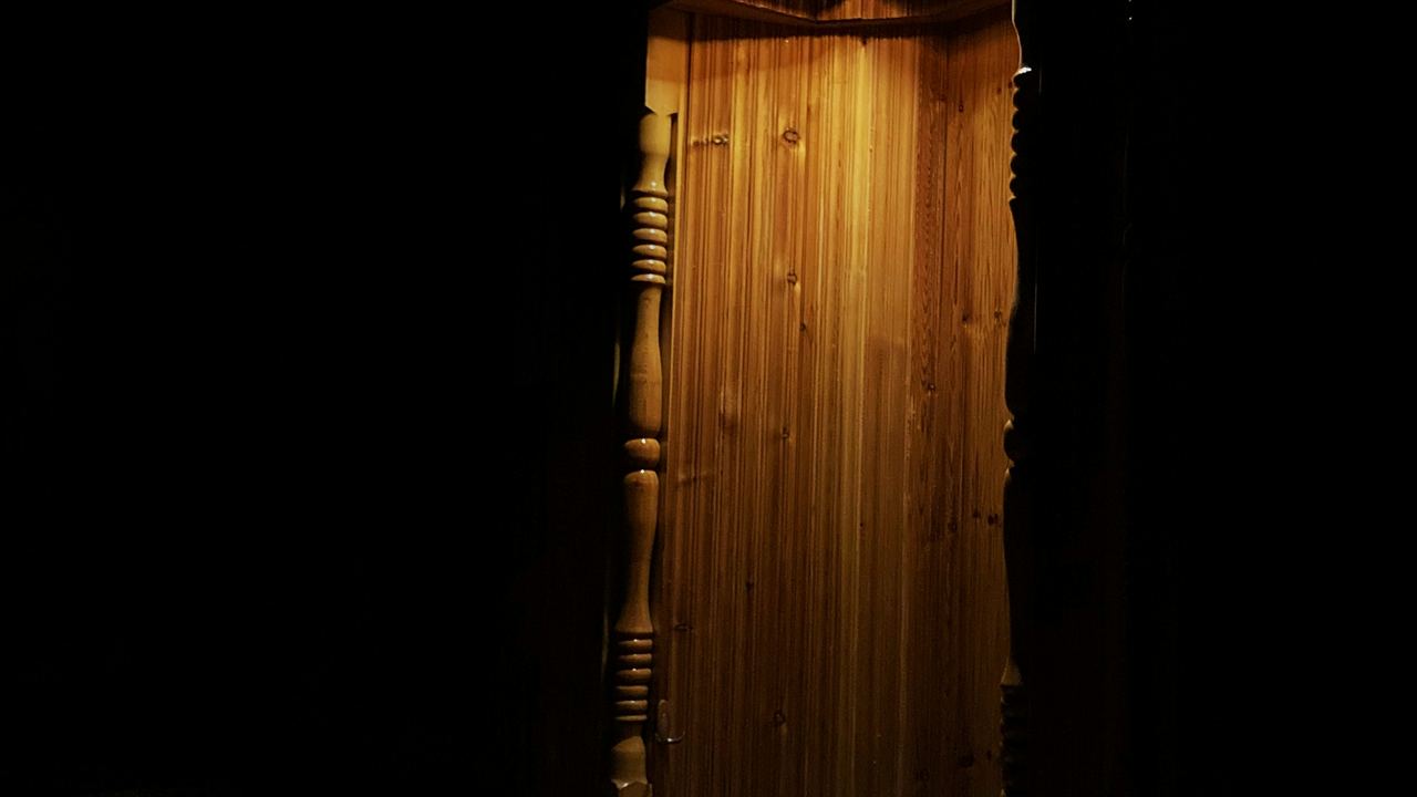 A prayer mat in a quiet, dimly lit room